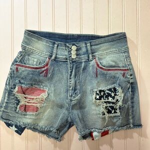 High-Rise Distressed Blue Denim Shorts with Flag Patch Accents